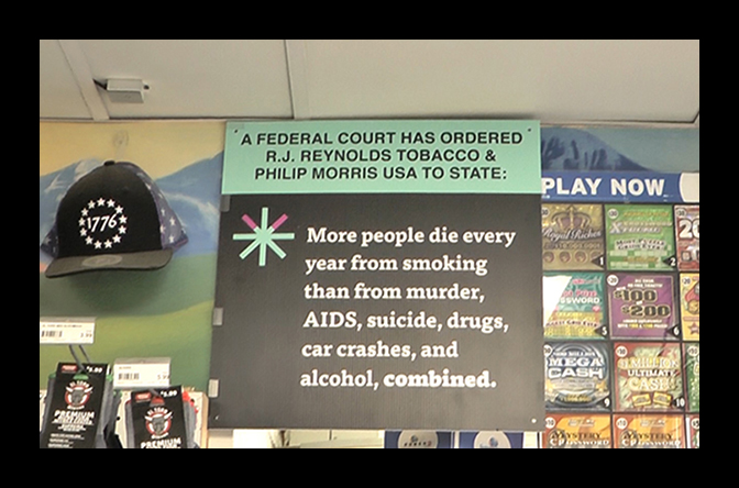 R.J. Reynolds and Philip Morris eventually got this sign taken down from stores and gas statios (211K)